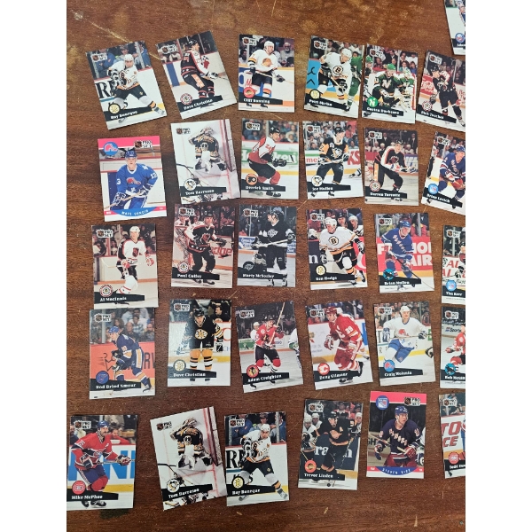 Two Factory-Sealed Hockey Card Sets with Assorted Loose Cards