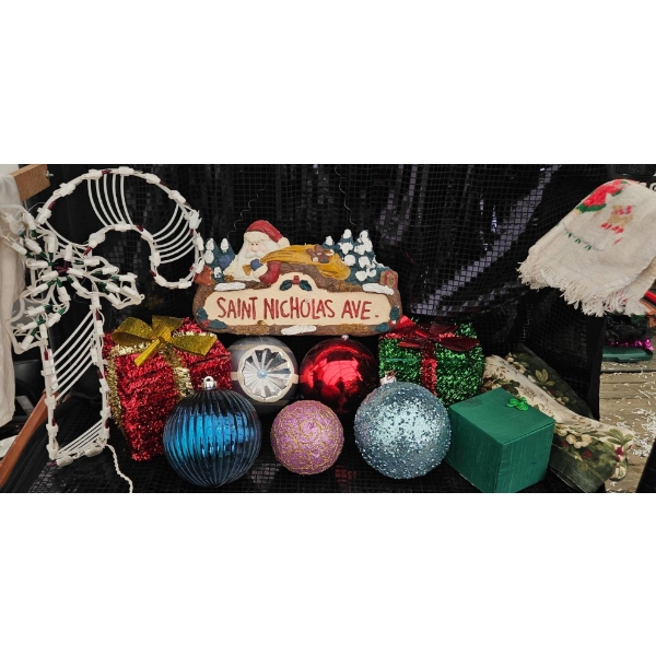 Christmas Decorations Including Ornaments, Saint Nicholas Plaque, and Candy Cane Light