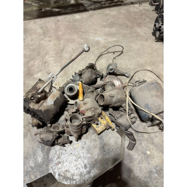 number of vintage and antique tractor parts gearbox carburetors electric motor