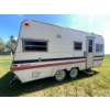 Ultimate Fishing Hut Built In A Vacationer Travel Trailer with 5 Pre made Fishing Holes Wood Burning