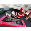 Image 1 : Santa statue 28” and Christmas express train Christmas globe and a small statue set Mrs. Claus and M