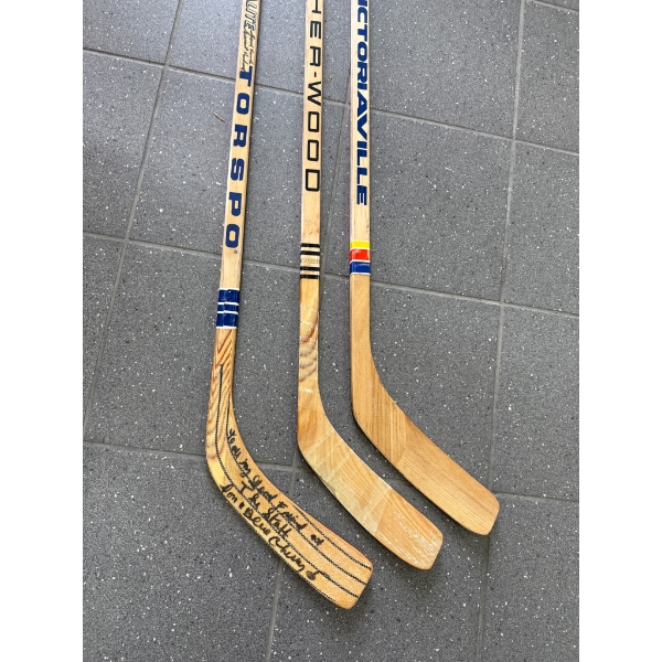 Three Vintage Wooden Hockey Sticks