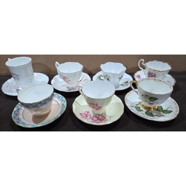 7 Teacups with Matching Saucers