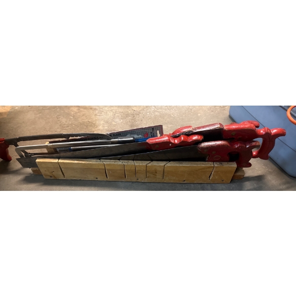 Handsaws with Red Wooden Handles and Sawing Block