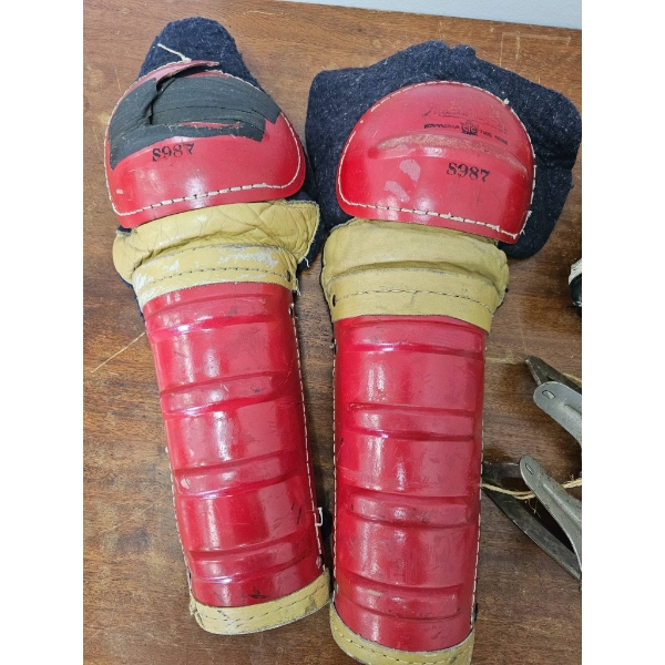 Vintage Hockey Gear Set with Shin Guards, Gloves, and Ice Skate Blades