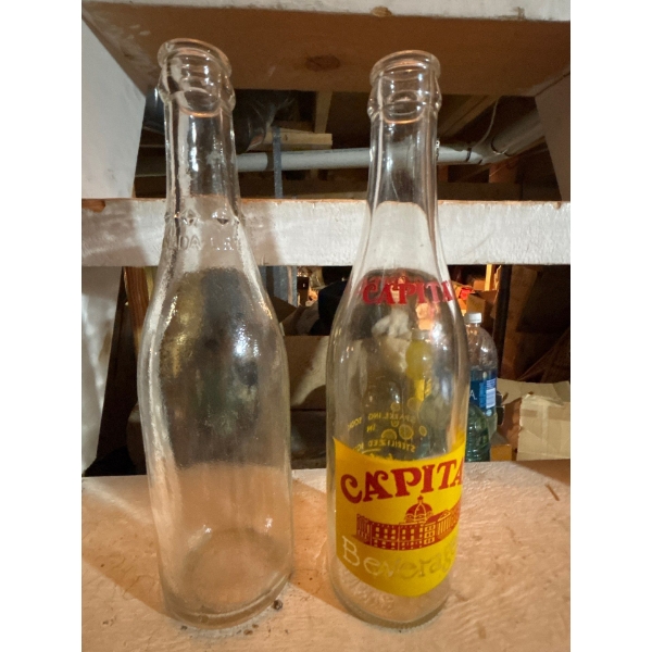 mint condition, Vintage beverage company and a glass no seem hand blown clear bottle