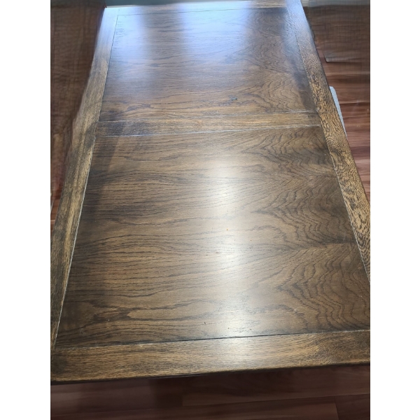 Scrolled Wood Pedestal Table with Two  Pullout Leaves.  54 w  32 d 30 h (leaves 15 w each)