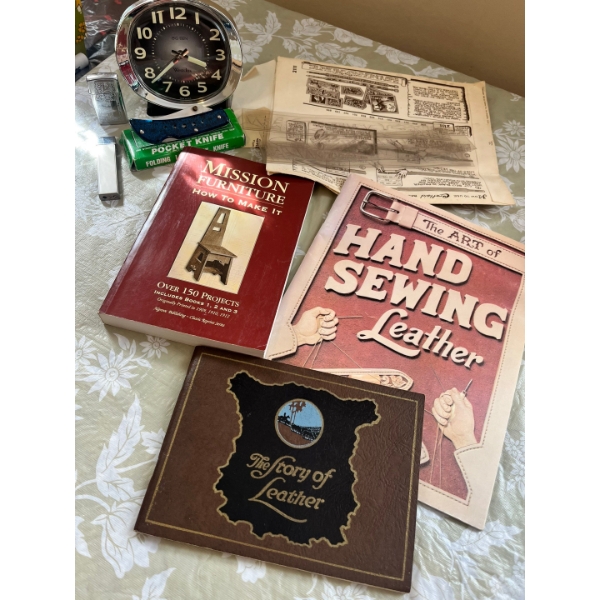 A couple books, including missions furniture (how to make furniture) the art of sewing leather, the 
