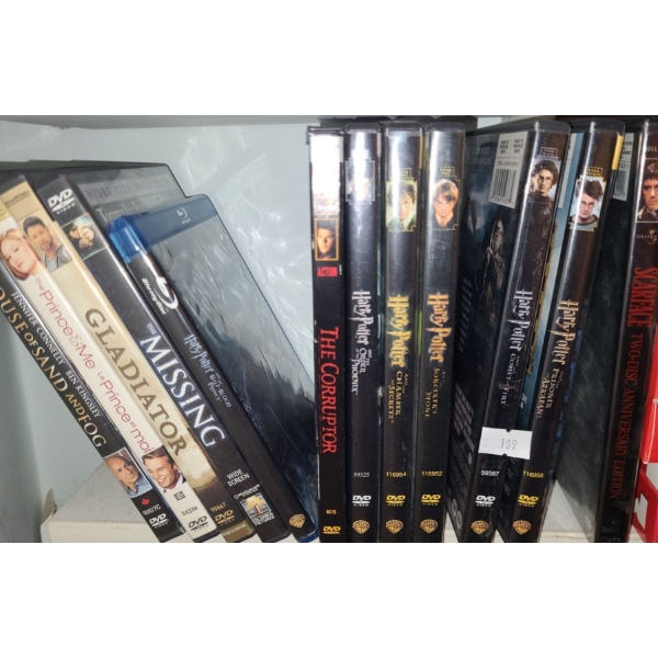 Shelf od DVD's: Gladiator, Harry Potter, Monk, Planet Earth, Michael and More!