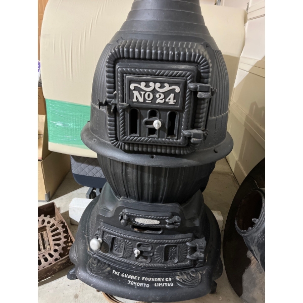 Antique Gurney Foundry Co. No. 24 potbelly stove, cast-iron stove known for its distinctive shape an