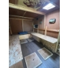 Image 6 : Ultimate Fishing Hut Built In A Vacationer Travel Trailer with 5 Pre made Fishing Holes Wood Burning