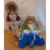 Image 1 : Porcelain Doll Collection: Vanessa, Baby in Blue PJ's, Girl in Green. Tallest is 17T 