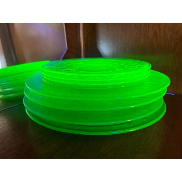 Uranium glass green four large plates and four small plates 