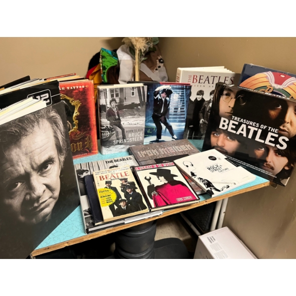 Assorted books featuring Beatles, U2, Michael Jackson’s, iron maiden and more