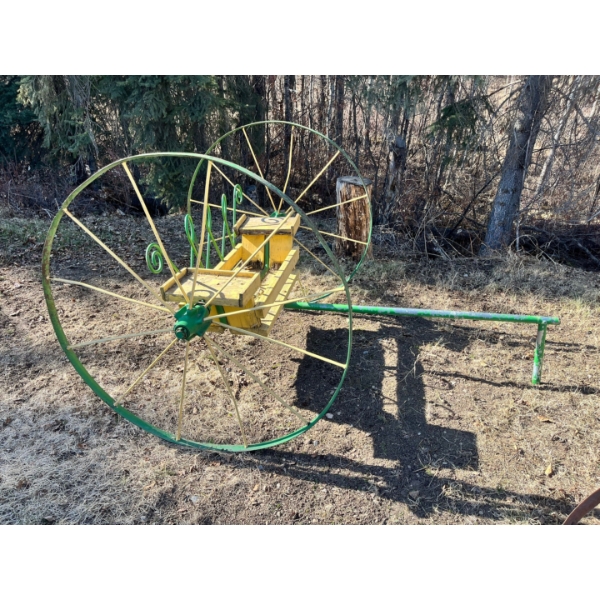 vintage antique agricultural tool used as lawn decor