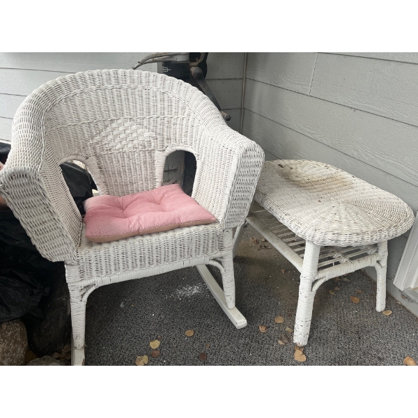 white wicker, rocking chair and small wicker white side table needs some love