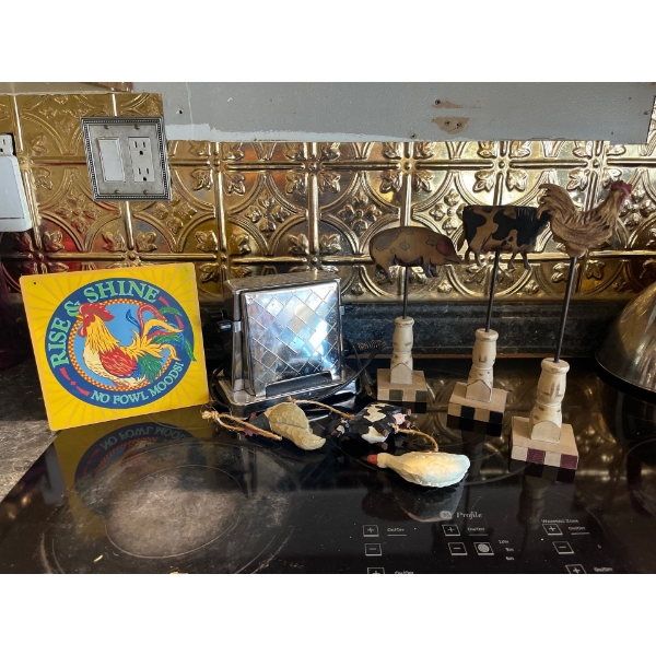 collection of kitchen ornaments, and a vintage chromed out toaster
