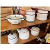 Image 1 : vintage white enamelware colander, likely featuring a black rim and footed base. Large kettle, doubl