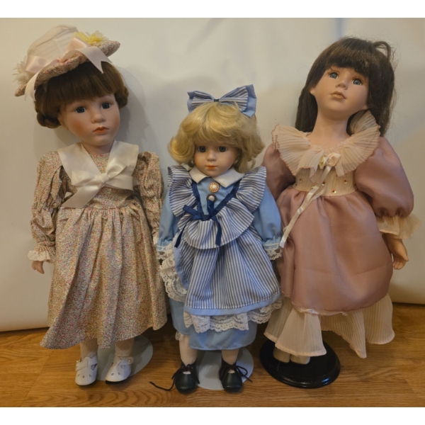 Porcelain Dolls: Fancy Females. Tallest is 18T