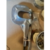 Image 5 : Hoover Press-N-Snap Tool, which is a professional-grade handheld tool used for quickly installing fa