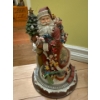 Image 2 : Disney Snow Globes (4), Santa Statues (2)