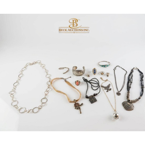 Jewelry Lot Featuring Necklaces, Rings, Bracelets, and Pendants