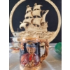 Image 6 : Decorative Nautical Lot with Resin Ship Plaque, Model Sailboat, Stein, and Coffee Mugs