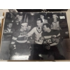 Image 6 : Black-and-White Hockey-Themed Film Stills on Display Boards