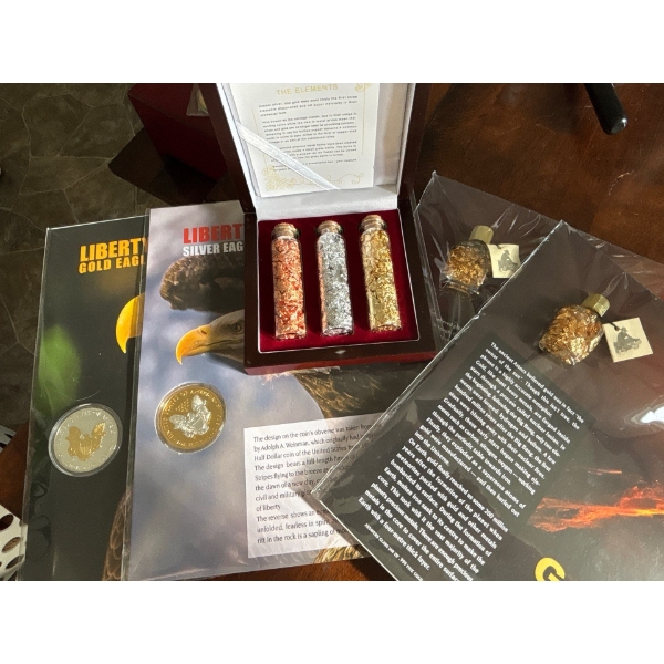 Collection of Us Coins & .999 fine gold leaf with a cased set of the elements 
