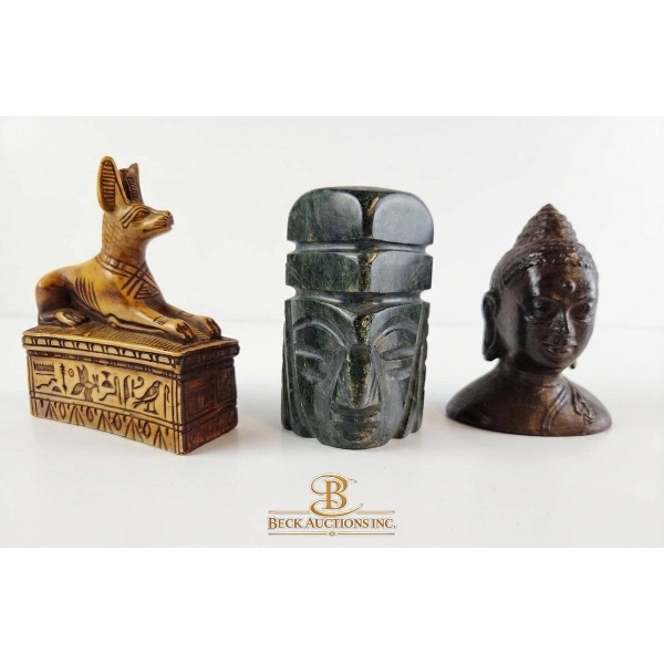 Three Decorative Figurines Featuring Anubis, Tribal Head, and Buddha
