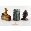 Image 1 : Three Decorative Figurines Featuring Anubis, Tribal Head, and Buddha