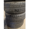 Image 2 : 4 Lightly Used Tires w/ NEW Car Matts 