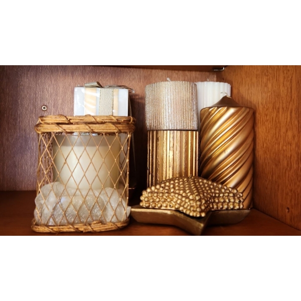 Contents of Cupboards: Candles, Tablecloths, Vases- Larger Blue 8 T, Smaller Blue 7 T 