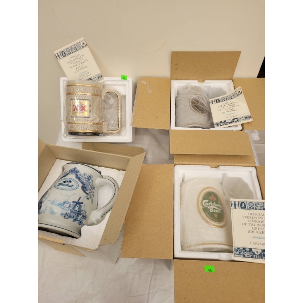 Four Collector's Brewery Tankards with Original Packaging