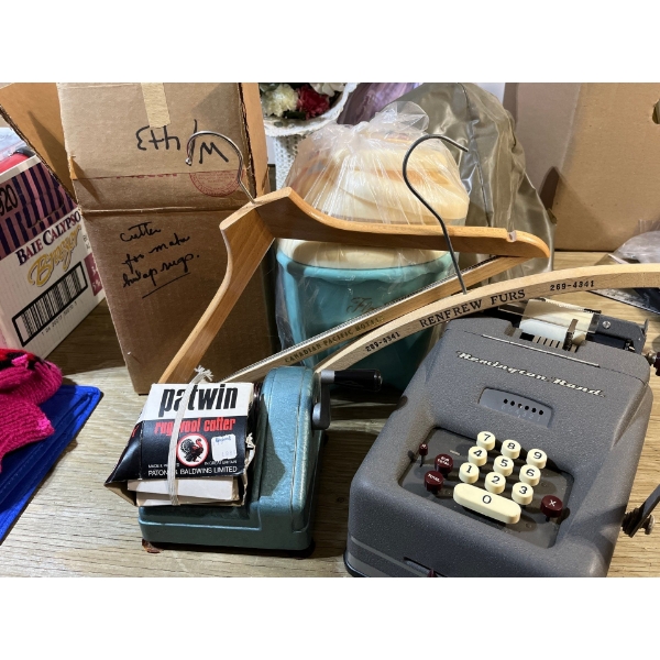 Remington ran adding machine, vintage carpet cutter, two wooden coat, hangers, and vintage baby blue