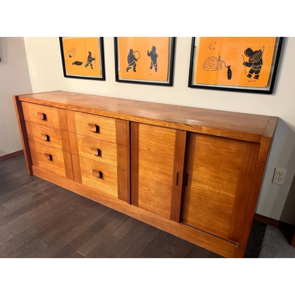 Teak Dresser very well made with six drawers and one set of sliding doors an amazing very well kept 