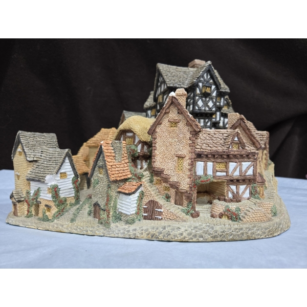 Hand Carving 'The Village' By David Winter 