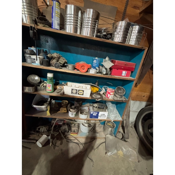 Heavy duty, wood shelf with all contents, including vintage tractor, parts, nuts, and bolts 
