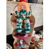 Image 1 : 80s yarn clown with corner shelf and assorted faux flowers 

