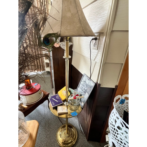 vintage brass floor lamp with an attached round shelf. Assortment of vintage cigarette boxes
