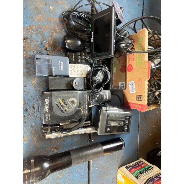collection of vintage digital cameras, Walkman microphones magnets of all sizes and GPS units
