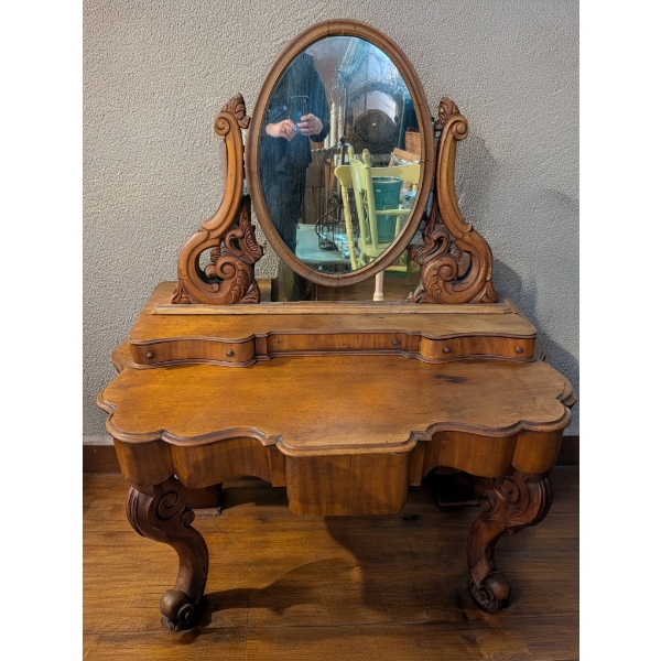 Ornately Carved Wood Vanity With Oval Mirror