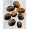 Image 1 : Tigereye (37.1 ct, Assorted mm Oval Cabochon)