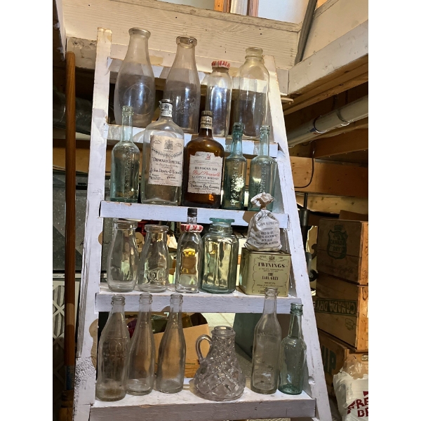 bottles galore, great collection of vintage bottles, Hudsons Bay best scotch, whiskey, Deward, speci