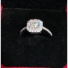 Image 2 : 1ct Round Moissanite with 28 Cubic Zirconium Chips Set in Sterling Silver Ring