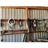Image 2 : . Bike, cords, belts, chains, and miscellaneous parts Everything on the wall
