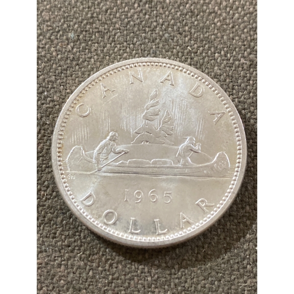 1965 Canadian Silver Dollar Coin Featuring 'Voyageur' Design