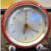 Image 11 : Decorative Clocks, Philishave Razor, and Peacock Artwork Display