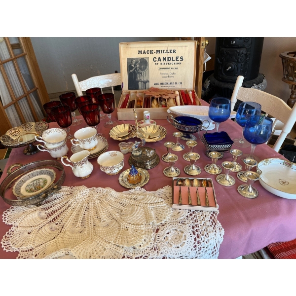 large collection of dining room items, including red French crystal wine, glasses, Mac Miller, candl