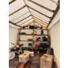 Image 4 :  carport with contents, contents include Weedwacker pressure, washer, electric motors, fertilizer, 